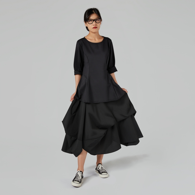 SKIRT WITH PLEATS IN TWO FABRICS