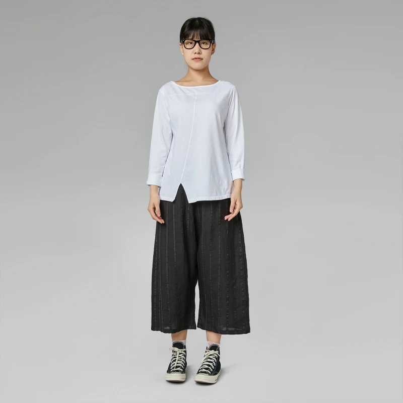 PANTALONI NERI A RIGHE CON...