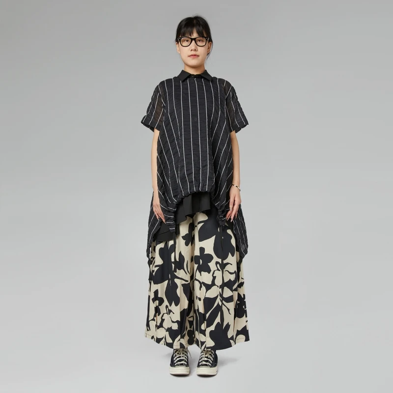 BLUSA SEMITRASPARENTE A...