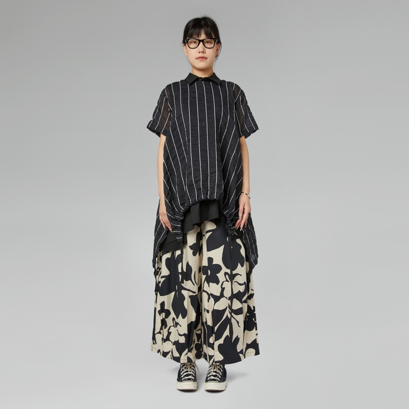 BLUSA SEMITRANSPARENTE A...