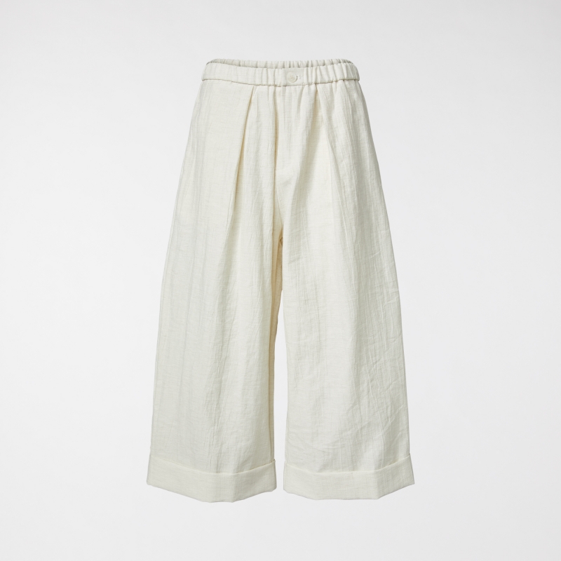 PANTALON À PLIS SUR LE...