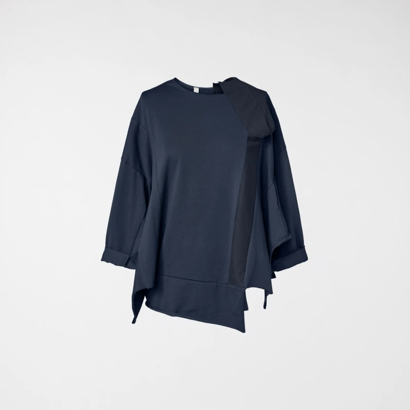 BLOUSE WITH KNITTED DETAILS...