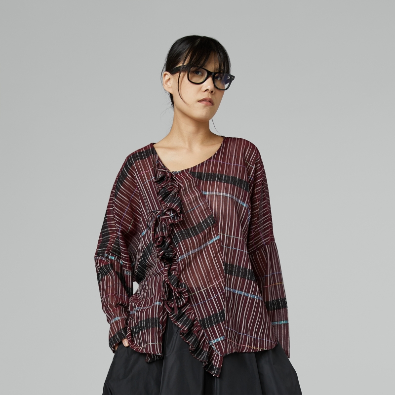 BLUSA SEMITRASPARENTE CON...