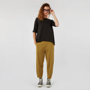 PANTALONI CON PIEGHE ALLA CAVIGLIA