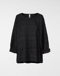 BLUSE MIT WELLENSTRUKTUR