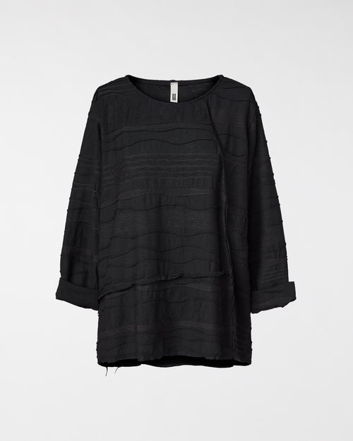 BLUSE MIT WELLENSTRUKTUR