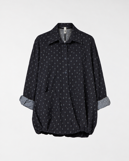 BLUSA CON APERTURA SUL RETRO