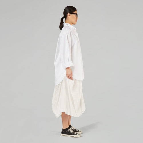 SHIRT WITH ACCESSORIES ON THE COLLAR