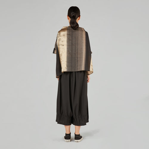 PANTALONES ANCHOS CON ALFORZAS EN EL DOBLADO