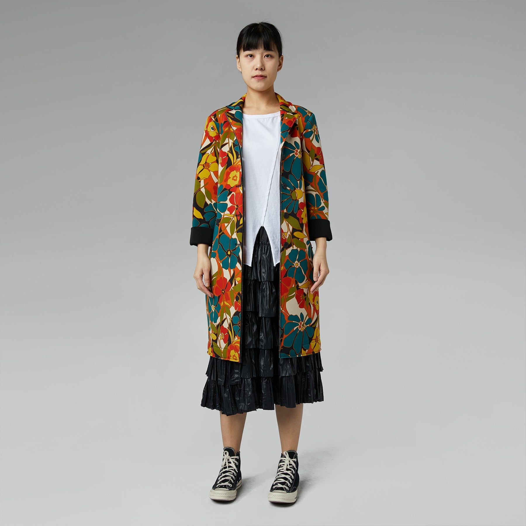 BLACK RUFFLED SKIRT IN FAUX LEATHER FABRIC