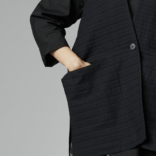 VEST IN RELIEF STRIPED FABRIC