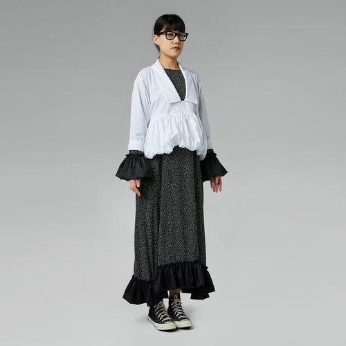 BLUSA CON ROUCHE E COLLO A PUNTA NERA