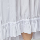 VESTIDO BLANCO CON CORDÓN EN LA PARTE INFERIOR