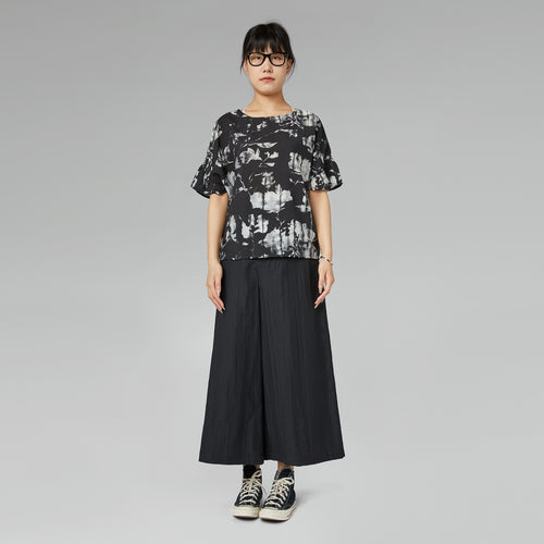 TROUSERS WITH OFF-CENTER BUCKLE MUD
