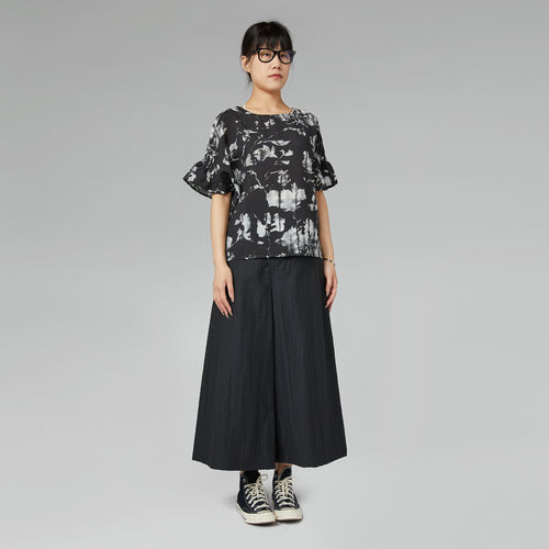 TROUSERS WITH OFF-CENTER BUCKLE MUD