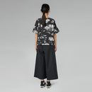 TROUSERS WITH OFF-CENTER BUCKLE MUD
