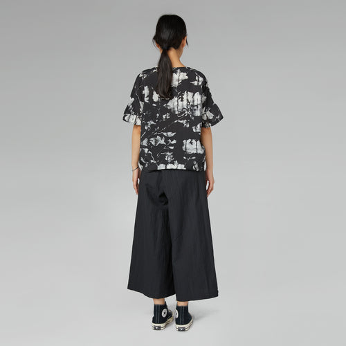 TROUSERS WITH OFF-CENTER BUCKLE MUD