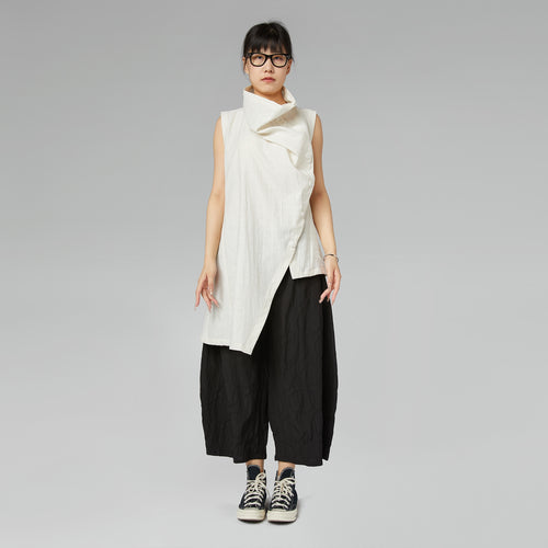 TROUSERS WITH PATTERN OF CIRCLES IN RELIEF