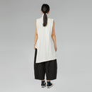 TROUSERS WITH PATTERN OF CIRCLES IN RELIEF