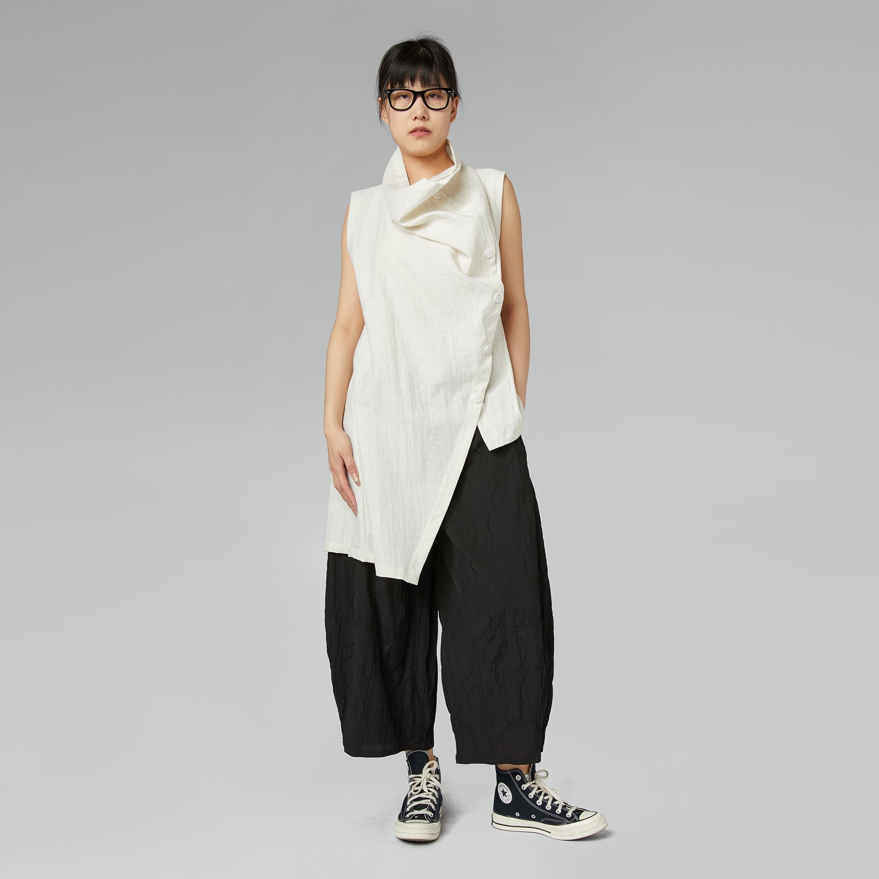 TROUSERS WITH PATTERN OF CIRCLES IN RELIEF