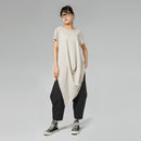 LE PANTALON SE RESSERRE A LA CHEVILLE