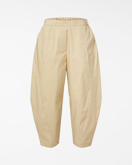 LE PANTALON SE RESSERRE A LA CHEVILLE