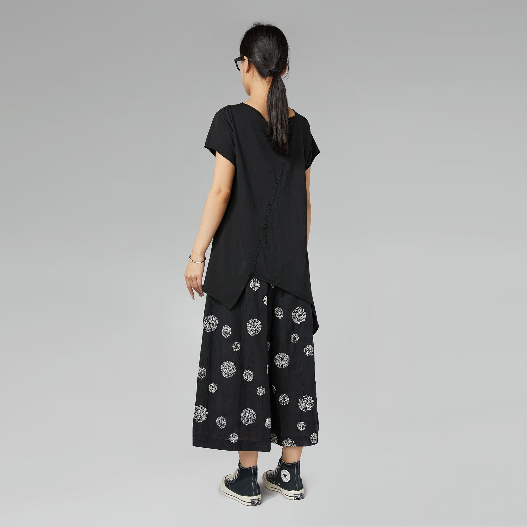 PANTALONI CON RICAMO A POIS