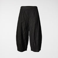 TROUSERS WITH PATTERN OF CIRCLES IN RELIEF