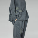 PANTALONES DE BURBUJAS GRIS