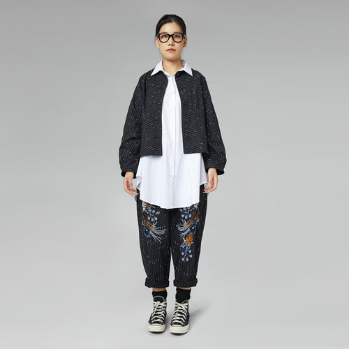 PANTALONI CON RICAMI FLOREALI