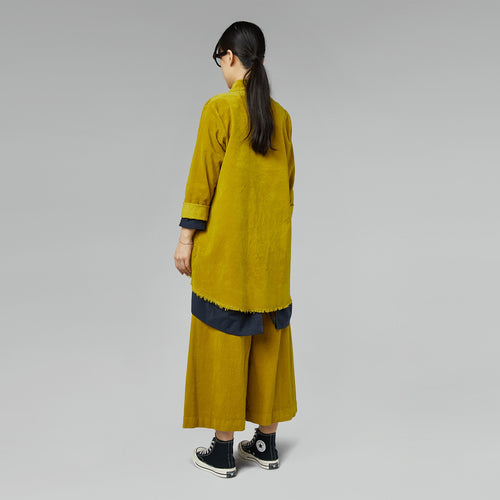 Spodnie aksamitne z szerokimi nogawkami w kolorze musztardowym