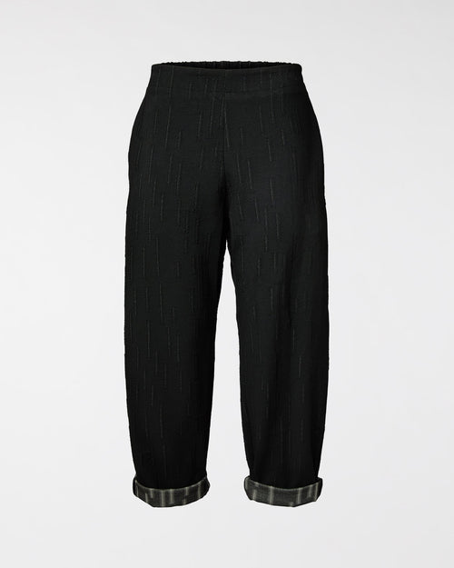 PANTALONES EN TELA DE ECLOSIÓN ESTAMPADA