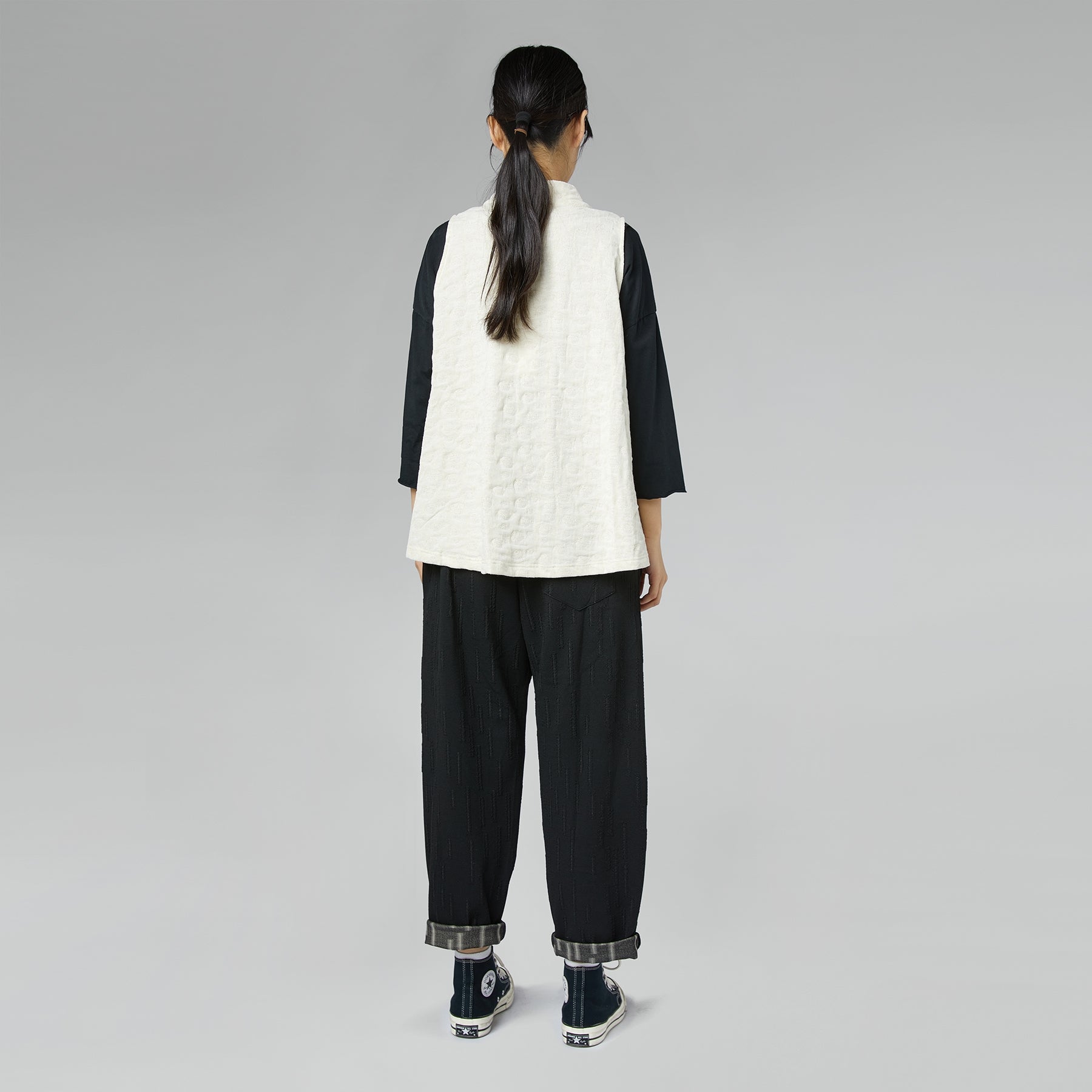 PANTS WITH EMBOSSED HATCHING