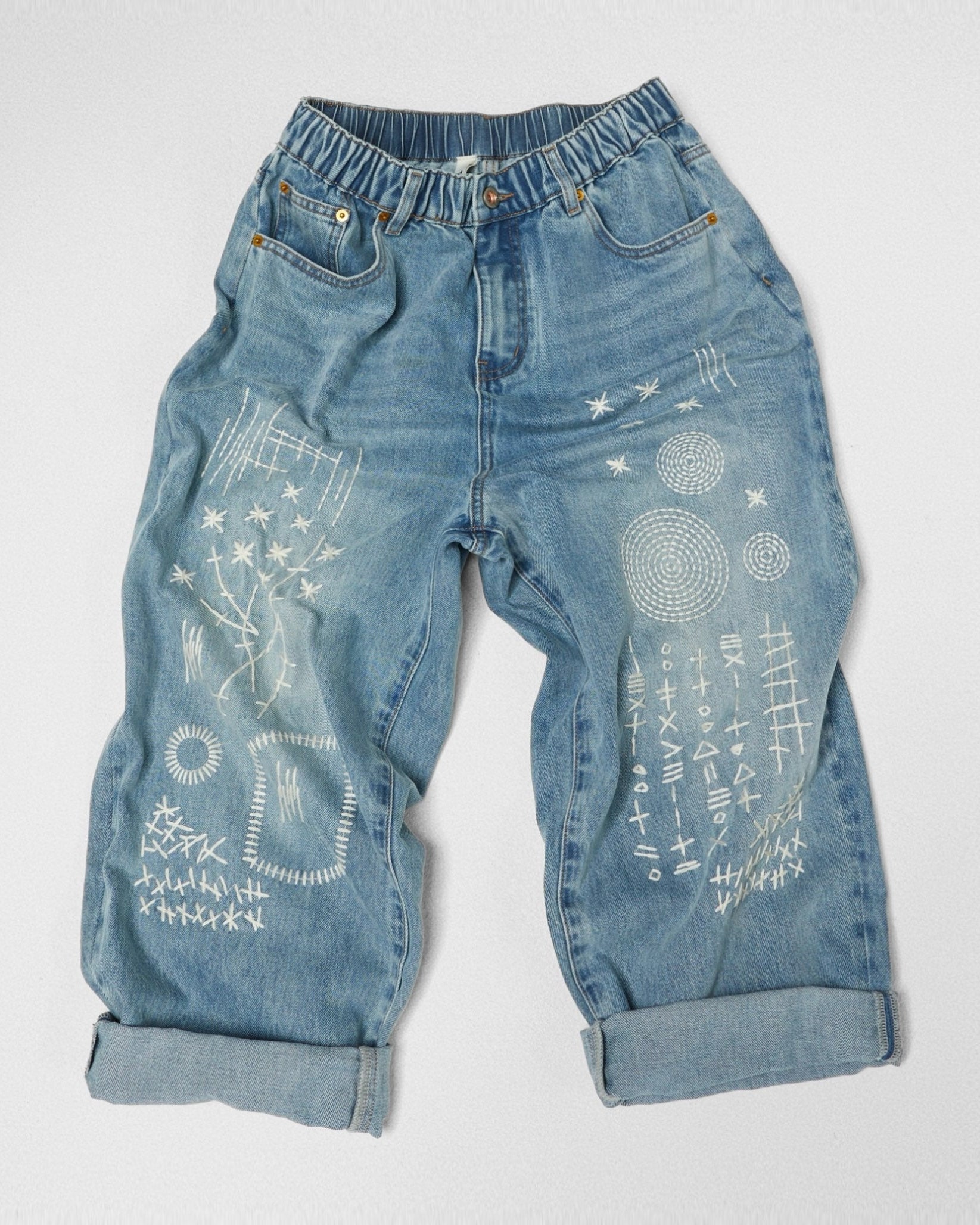 JEANS WITH GEOMETRIC EMBROIDERY