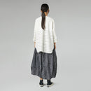 SKIRT WITH SEWN LACE FABRIC