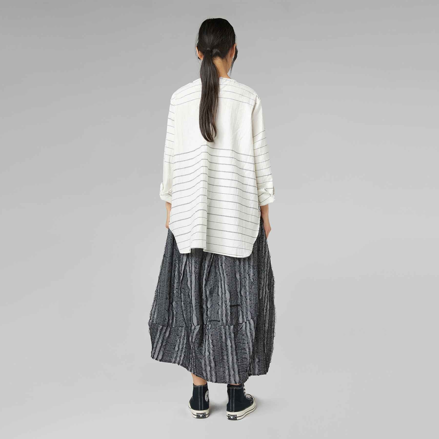 SKIRT WITH SEWN LACE FABRIC