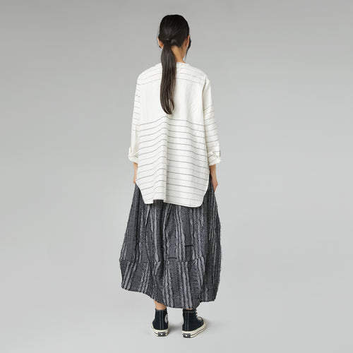 SKIRT WITH SEWN LACE FABRIC