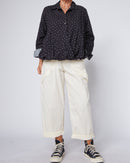 BLUSA CON APERTURA SUL RETRO