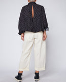 BLUSA CON APERTURA SUL RETRO