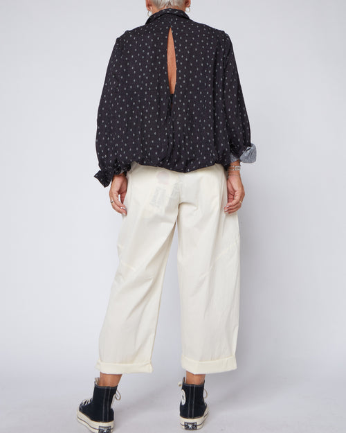 BLUSA CON APERTURA SUL RETRO