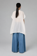 FLARED LIGHT DENIM TROUSERS