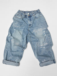 BAGGY JEANS WITH STRASS TEXT