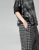 CHECKED TROUSERS WITH SIDE POCKETS