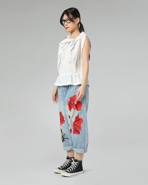 JEANS AVEC BRODERIE COQUELICOT