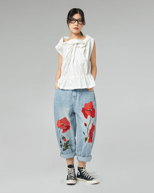 JEANS AVEC BRODERIE COQUELICOT
