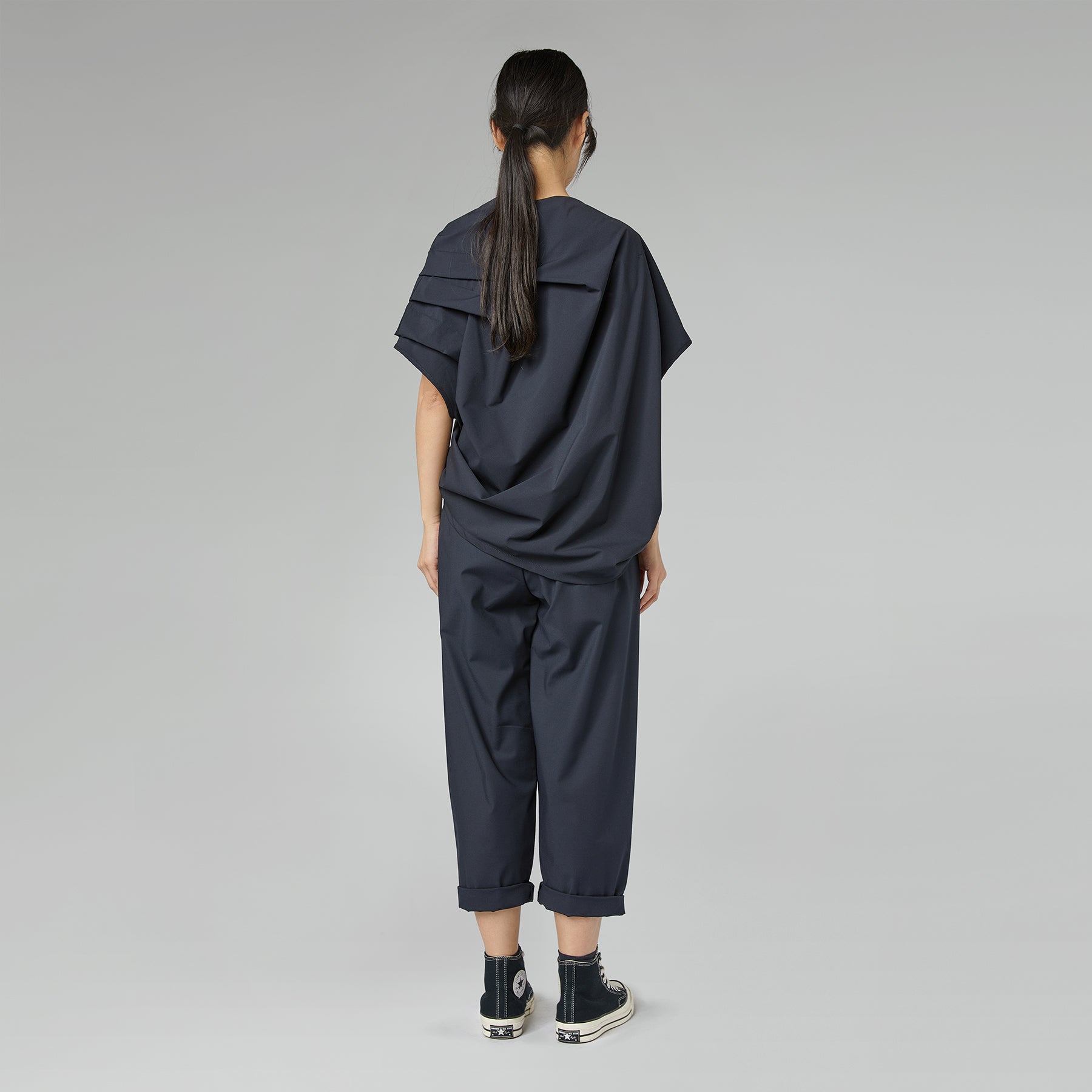 BLUSE MIT KÖPERFALTEN SCHWARZ