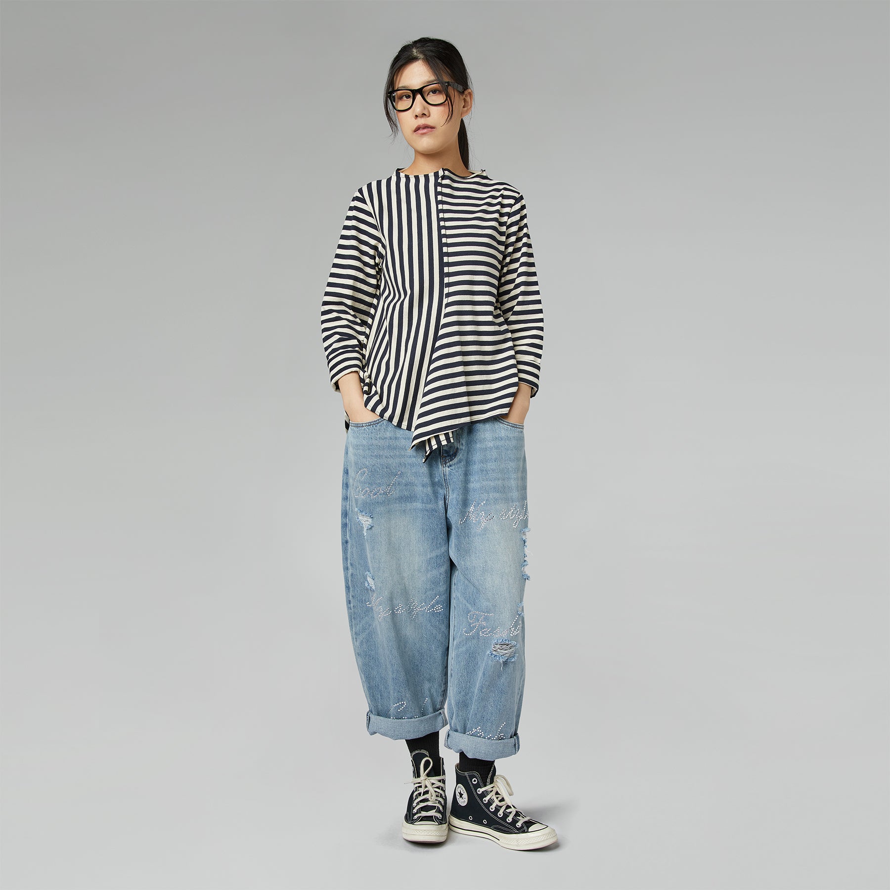 BLUSA RAYADA ASIMÉTRICA AZUL