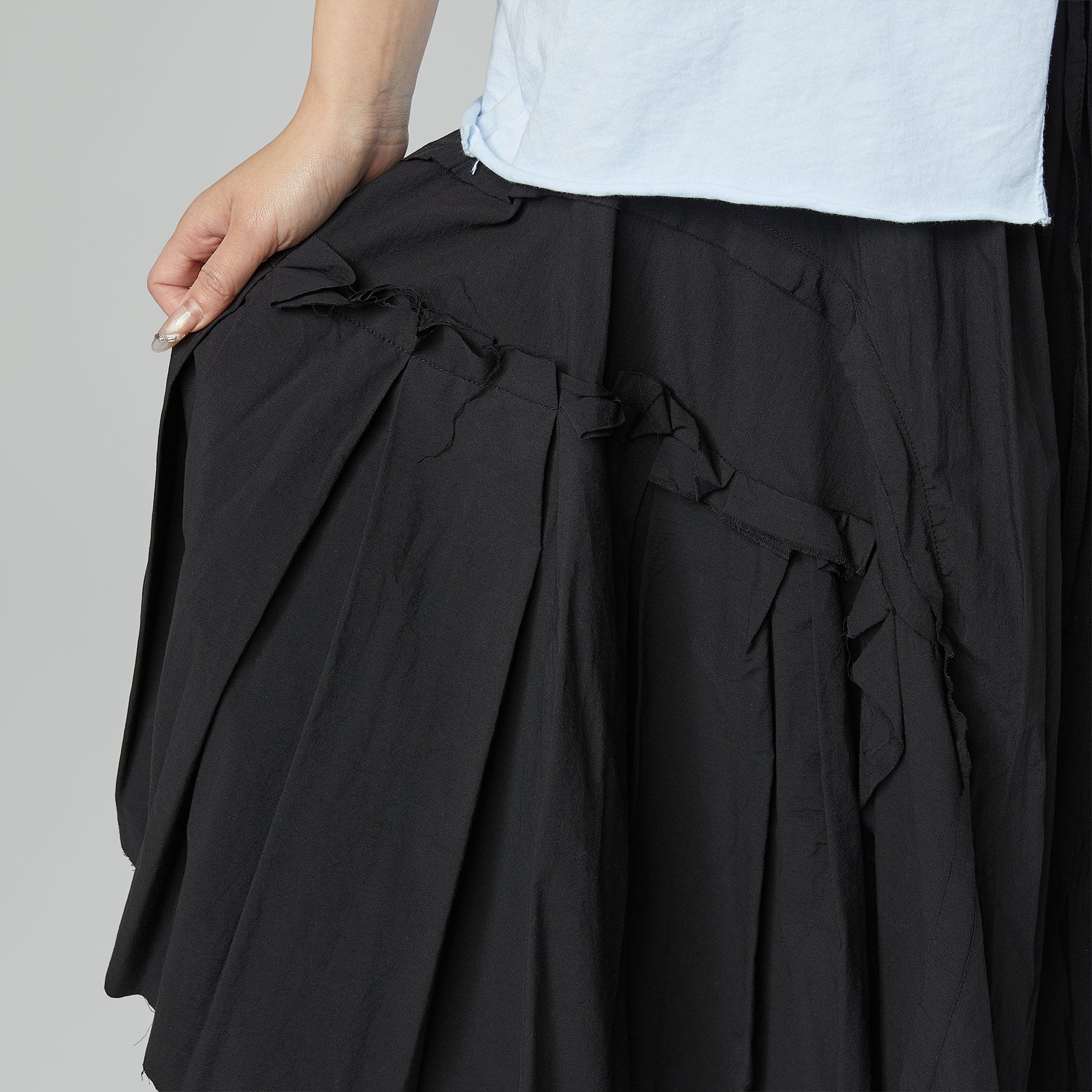 Rozkloszowana spódnica plisowana