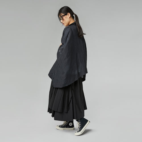 Rozkloszowana spódnica plisowana