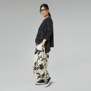 TROUSERS WITH STYLIZED PRINT